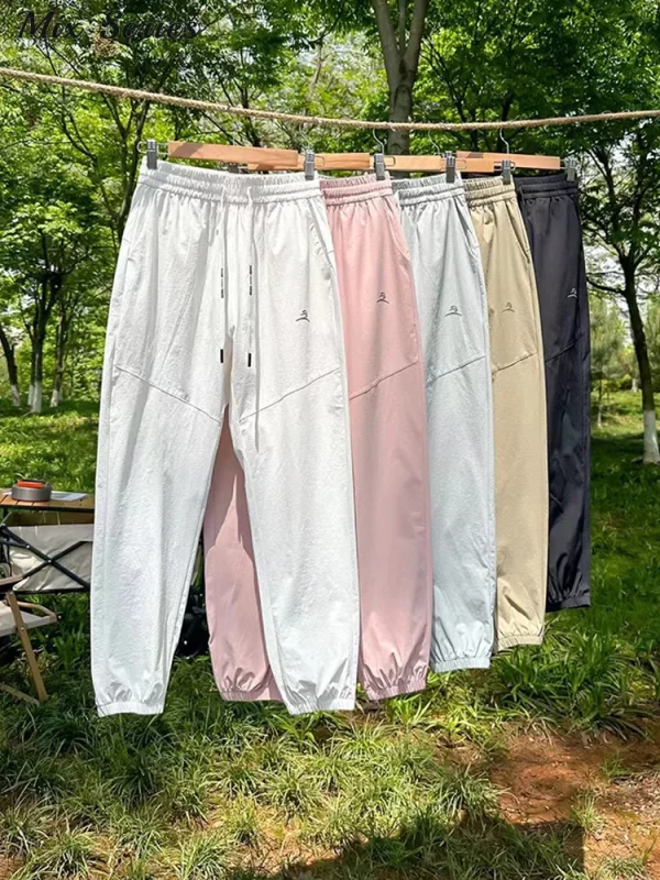 Pantaloni casual ad asciugatura rapida in seta di ghiaccio pantaloni sportivi in vita elastica con coulisse allentata 2024 autunno nuova moda femminile abbigliamento sportivo 3