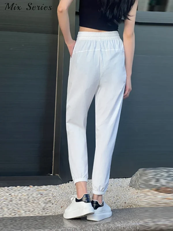Pantaloni casual ad asciugatura rapida in seta di ghiaccio pantaloni sportivi in vita elastica con coulisse allentata 2024 autunno nuova moda femminile abbigliamento sportivo 4