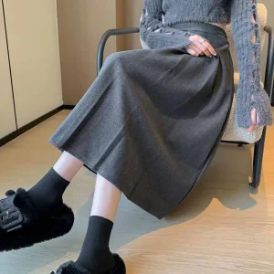 2025 nuove gonne a pieghe a vita alta per le donne autunno inverno addensare gonne di lana femminile stile college pieghe gonna lunga a-line 1