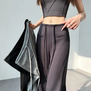 Pantaloni sportivi a gamba dritta casual larghi da ragazza piccante in stile americano da donna con design con tasca frontale e pantaloni a gamba larga pendenti 1