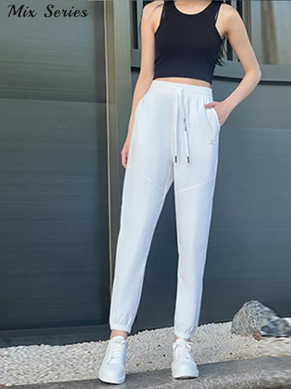 Pantaloni casual ad asciugatura rapida in seta di ghiaccio pantaloni sportivi in vita elastica con coulisse allentata 2024 autunno nuova moda femminile abbigliamento sportivo 2