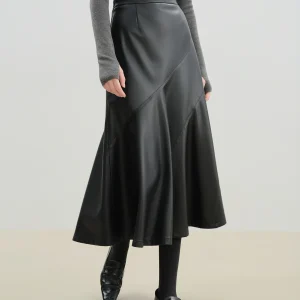 ZIQIAO Petite Gonna da donna in pelle PU con taglio diagonale nero con orlo a ombrello 2025 Minigonna a trapezio sensibile al design autunno/inverno 1