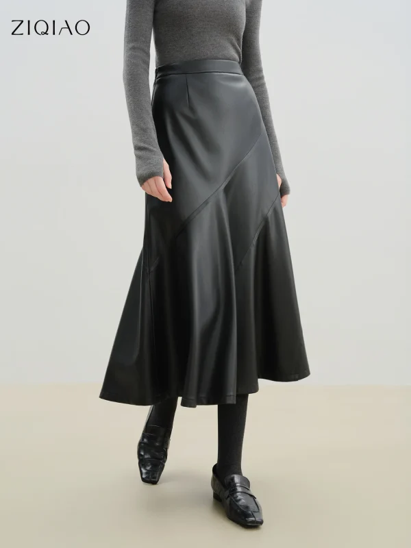 ZIQIAO Petite Gonna da donna in pelle PU con taglio diagonale nero con orlo a ombrello 2025 Minigonna a trapezio sensibile al design autunno/inverno 1