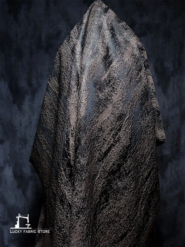 Tessuto con trama jacquard con motivo a grana tridimensionale irregolare astratto realizzato con tessuti per abbigliamento autunnale e invernale 3