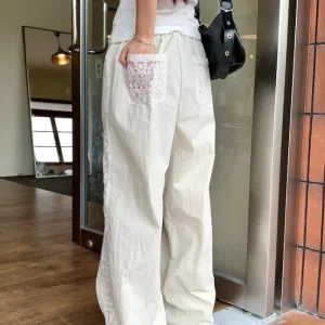 Pantaloni a gamba larga in pizzo per le donne nell'estate 2025 Nuovo design casual a gamba dritta a vita alta Protezione solare Pantaloni in seta ghiacciata fresca Camminata 1