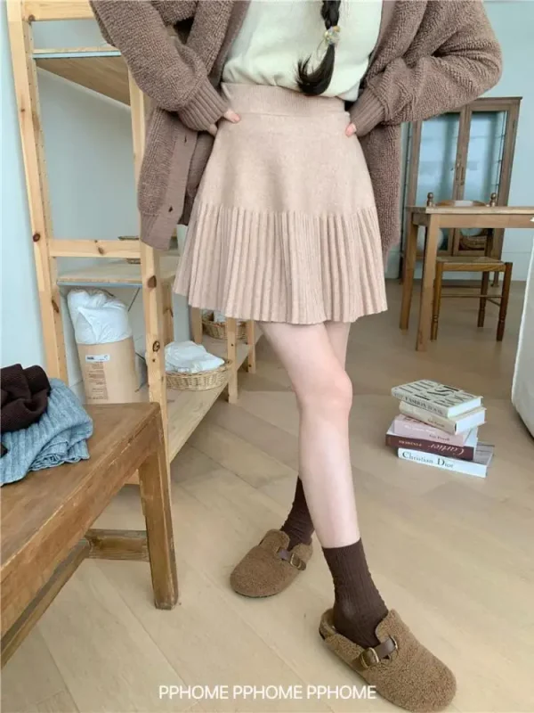 Gonna corta a pieghe da club sexy elegante in maglia solida da donna coreana moda autunno inverno vita alta vacanza minigonna a trapezio casual 4
