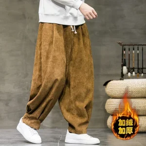 Pantaloni di velluto a coste invernali Pantaloni sportivi Harem oversize ispessiti in pile tinta unita di nuova moda da uomo Pantaloni casual caldi da donna invernali 1