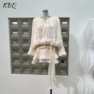 KBQ Solid Patchwork Lace Up Abiti larghi per le donne O Collo Manica lunga Vita alta Pieghe impiombate Temperamento Abito Moda femminile 1