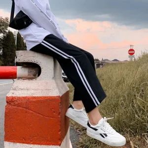 Pantaloni sportivi a gamba larga patchwork a righe in vita elastica stile preppy Pantaloni dritti casual primavera autunno Abbigliamento donna di moda 1