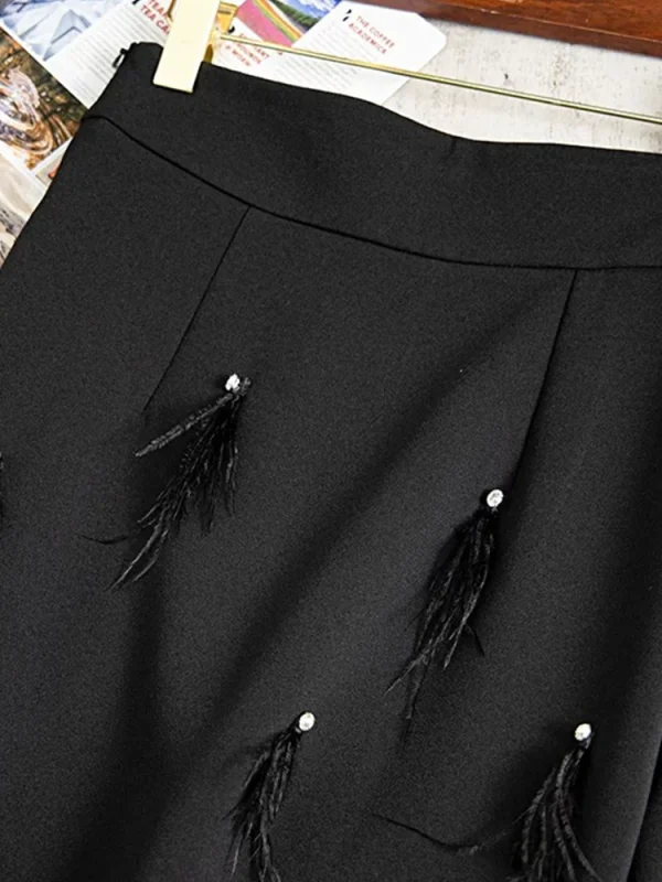 Retro 2024 autunno donna nuova gonna pesante con nappe con strass e piume moda Joker gonna dritta nera all'anca. 3