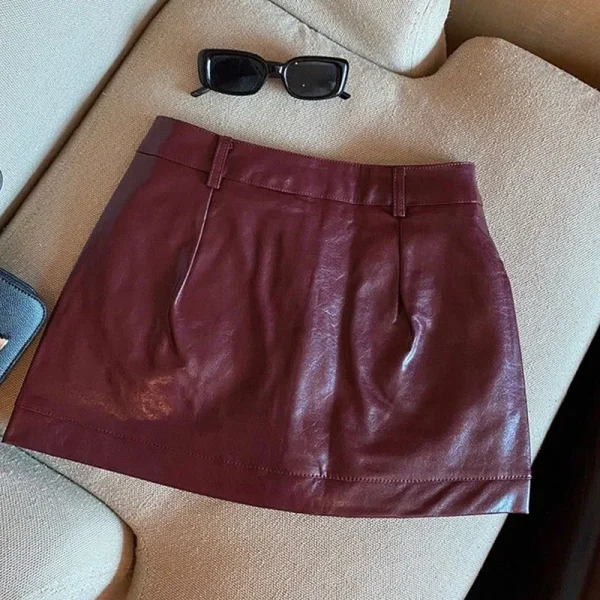 Gonne in pelle PU rosso vino per donna Clubwear sexy Minigonna in pelle avvolta sui fianchi Gonne corte antiriflesso autunno inverno femminile 4