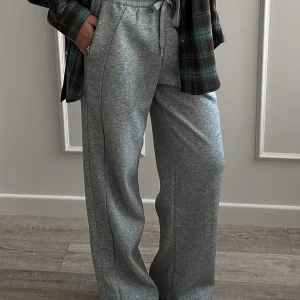 Pantaloni sportivi grigi a gamba dritta Pantaloni neri a gamba larga da donna Pantaloni larghi a vita alta autunnali Pantaloni sportivi da jogging bianchi per le donne 1