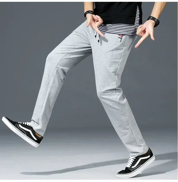 Pantaloni primaverili da uomo Fitness Abbigliamento sportivo Tuta Elastico in vita Pantaloni sportivi Pantaloni di cotone Palestre larghe Pantaloni da jogging da uomo M- 8XL 6