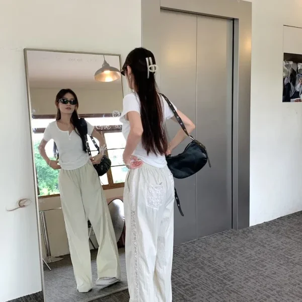 Pantaloni a gamba larga in pizzo per le donne nell'estate 2025 Nuovo design casual a gamba dritta a vita alta Protezione solare Pantaloni in seta ghiacciata fresca Camminata 5