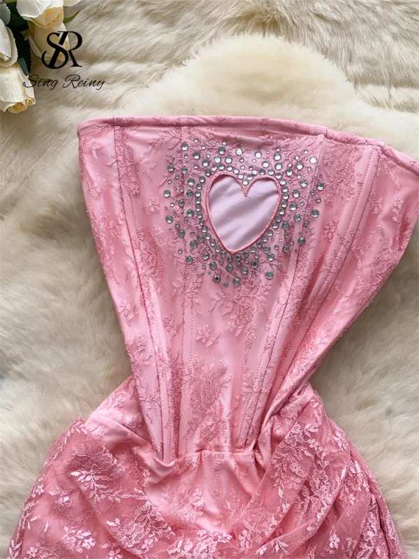 SINGREINY Abito corto sexy senza spalline francese 2025 Cuore scava fuori Perline Vestito estivo Corsetto senza schienale Mini abito da spiaggia in pizzo 4