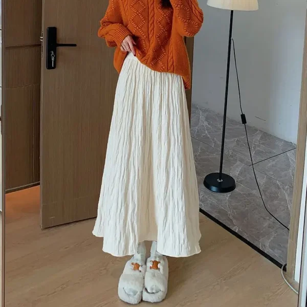 Mezza gonna piegata originale autunno/inverno 2025 edizione coreana a vita alta gonna grande altalena gonna lunga calda in lana lavorata a maglia spessa 2