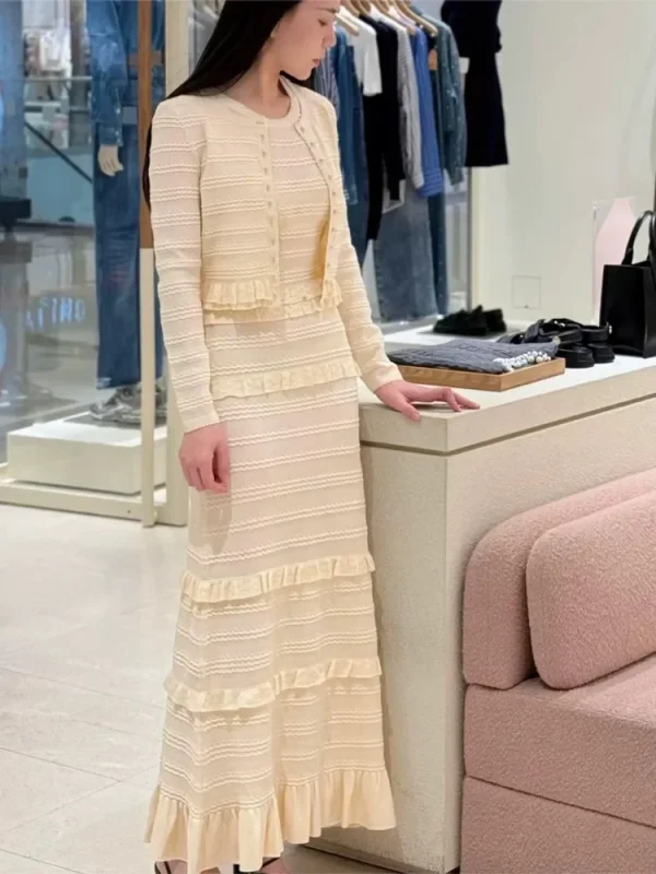 Abito longuette sottile con scollo a barchetta in maglia senza maniche da donna con volant o maglione cardigan monopetto a maniche lunghe 1