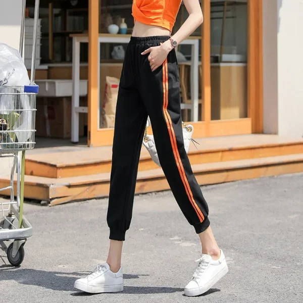 Pantaloni Harem larghi neri a nove tendaggi Pantaloni lunghi sportivi larghi da donna Autunno Nuovo stile Pantaloni con risvolto casual AE Stock Origine Mento 4
